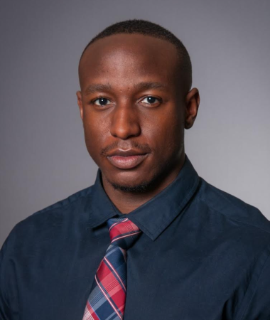 Professional headshot of Nubian Square Investment Advisors' Jakobe Clark, CPA Tax Planning & Solutions Advisor